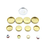 A collection of brass and metallic plugs and caps, organized in rows on a white background. The Engine Rebuild Kit by Partsology features an assortment of various sizes and shapes, with some pieces engraved with measurements like "1 1/4".